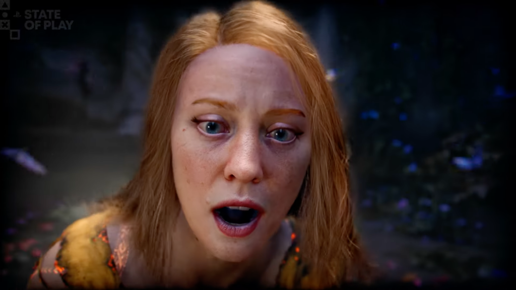 Grande plano do rosto de Faye, personagem do universo God of War, com cabelo ruivo e uma forte expressão de espanto e choque. O cenário de fundo é escuro, místico e conta com pequenas partículas luminosas azuis e roxas. No canto superior esquerdo, encontra-se o logótipo "PlayStation State of Play".